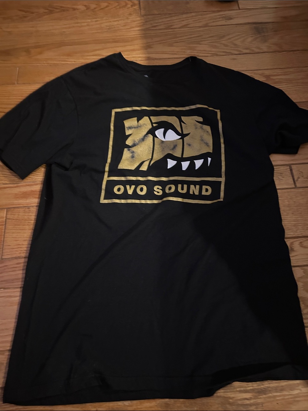 OVO Black Short Sleeve Tee with Gold OVO Sound Graphic